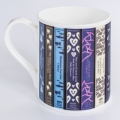 Lakeland book patterned coffee mug handle
